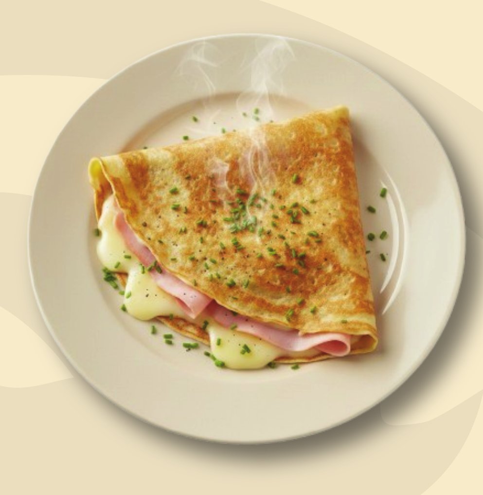 Folded ham and cheese savory crêpe, garnished with chives